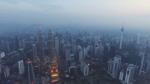 Aerial shot of KLCC or Petronas Twin Towers and Kuala Lumpur downtown at sunset Stockbeeldmateriaal 119121353