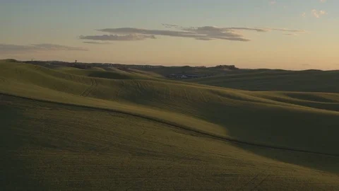 Aerial shot of a landscape at sunset 動画素材 76237280