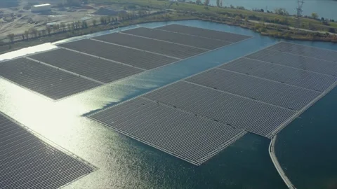 Aerial shot of the largest solar panel farm floating on a lake, Orange, France Stock Footage 292809063