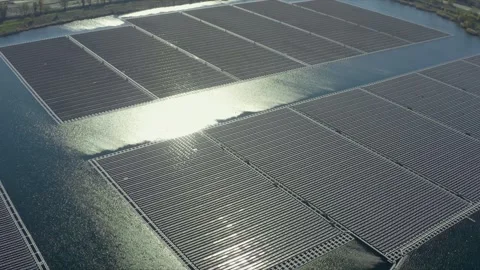 Aerial shot of the largest solar panel farm floating on a lake, Orange, France Stock Footage 292809068