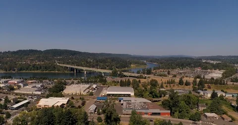 Aerial shot lifting up through trees in Oregon City revealing Abernathy Bridge Video stock 118653413