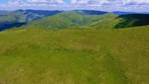 Aerial shot of a lizard looking crest in the Carpathian Mountains in summer Stock Footage 93636993