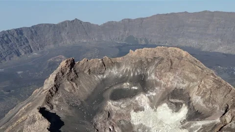 Aerial shot looking directly into the rugged crater of Pico do Fogo Cabo Verde Видео 335209058