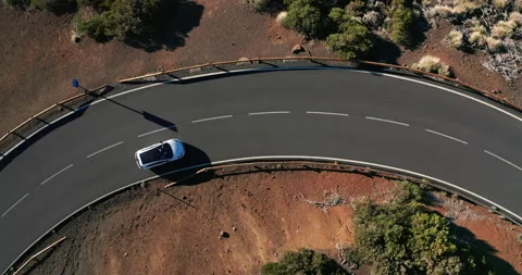 Aerial shot. Looking down. Car go new ideally flat asphalt road. Fresh white Video stock 144096886