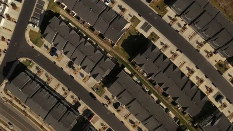 Aerial shot looking down on dense suburban housing development Stock Footage 130667537