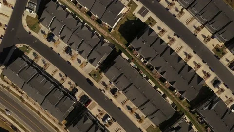 Aerial shot looking down on dense suburban housing development Stock Footage 146921794