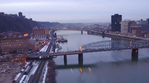 Aerial shot looking down the Monongahela River  at Pittsburgh and Station Square Stock Footage 59384500