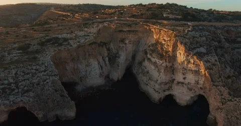 Aerial shot looking at European Cliffs during Sunset Stock Footage 61380705