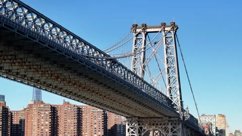 Aerial shot looking up at New York City's Williamsburg Bridge Video stock 254031153