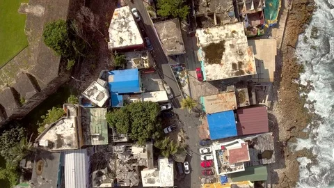 Aerial shot looking right over La Perla in Old San Juan, Puerto Rico Stock Footage 98275564