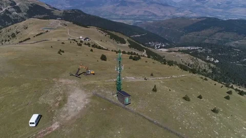 Aerial shot of a machine working in a ski slope. La Molina Masella, Catalonia. Stock Footage 141121864