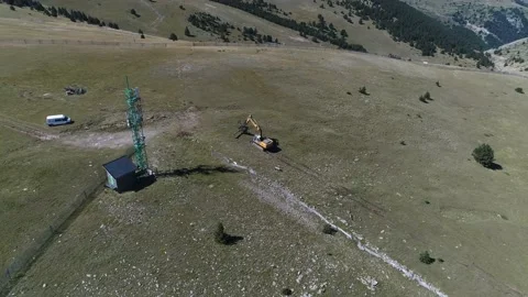 Aerial shot of a machine working in a ski slope. La Molina Masella, Catalonia. Stock Footage 141121865