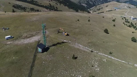 Aerial shot of a machine working in a ski slope. La Molina Masella, Catalonia. Stock Footage 141122502