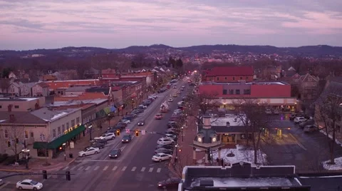 Aerial shot of main street midwest during Christmas season at sunset  Stock Footage 59169581