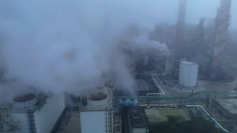 Aerial shot of a massive sugar refinery in England with large domed storage Stock Footage 328956802