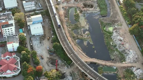 Aerial Shot of Metro Train Passing Through Anna Nagar Chennai India Stock Footage 336426943