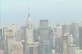 Aerial shot of Midtown Manhattan centered on The Chrysler Building Footage