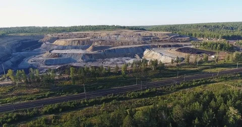 Aerial shot mining quarry Vídeo Stock 70369389