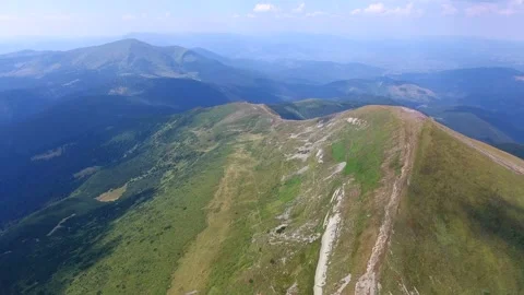 Aerial shot of Mount Hoverla with steep slopes in summer Video stock 86387847