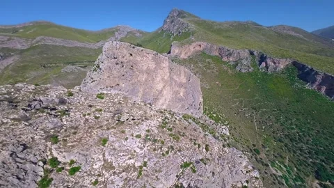 Aerial shot of mountain goats on a tiny peak, Sicily, Italy, 4K 60p Stock Footage 288652169