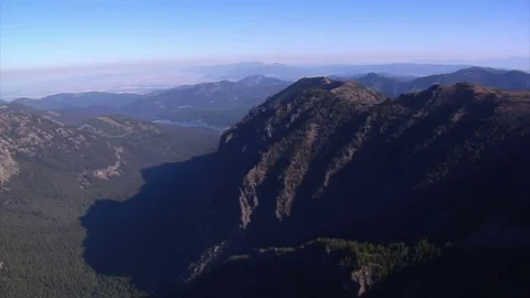 Aerial shot of mountain peaks and cliff walls Stock Footage