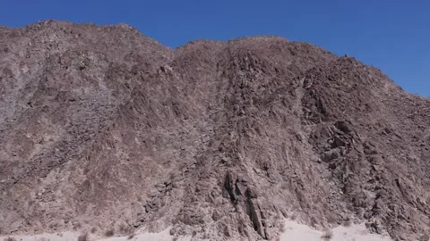 Aerial shot of mountain range in desert Stock Footage 246247703