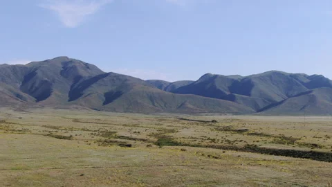 Aerial shot of a mountain range 스톡 동영상 242745506