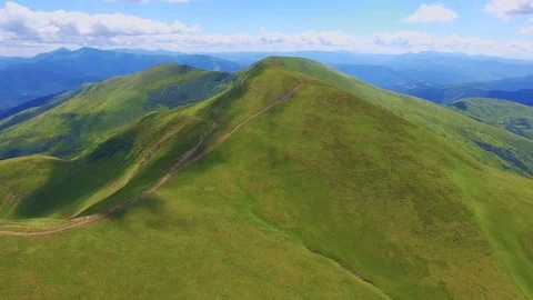 Aerial shot of a mountain range looking like a huge monster in the Carpathians Stock Footage 93639529