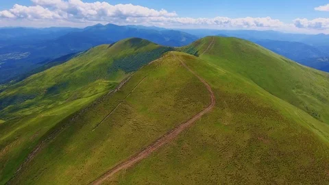 Aerial shot of a mountain range looking like a giant dragon in the Carpathians Stock Footage 93642411