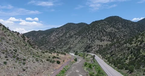 Aerial shot of Mountains with river 1 動画素材 250352200