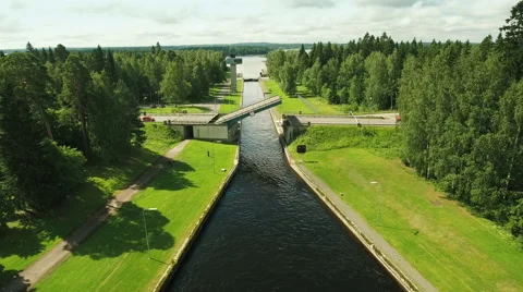 Aerial Shot of Movable Bridge Surrounded by Forest Stock Footage 65250241