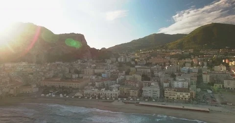 Aerial shot moving backwards over Cefalu Stock Footage 76992271