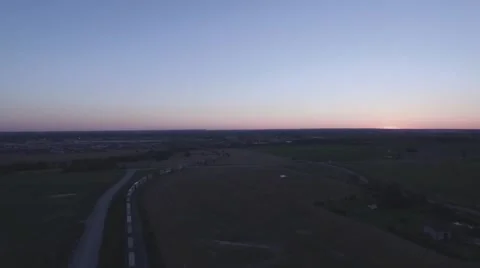 Aerial shot moving cargo train camera panning during sunset Stock Footage 60133340