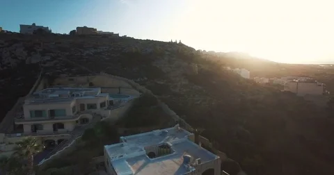 Aerial shot moving forward during sunset Stock Footage 70951649