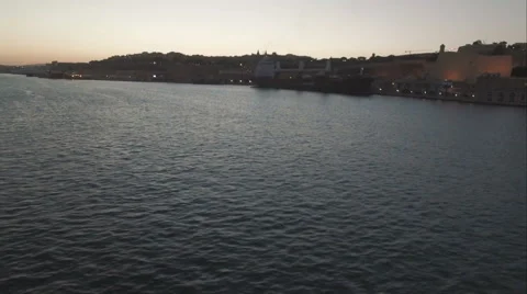Aerial Shot - Moving Sideways over the sea by the city Stock Footage 61256920