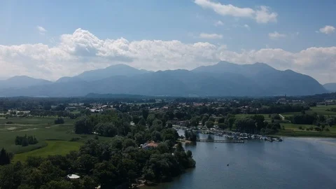 Aerial shot moving towards the alps over a lake Stock Footage