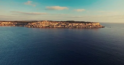 Aerial shot moving towards Cliffs in Mellieha, Malta Stock Footage 75216268