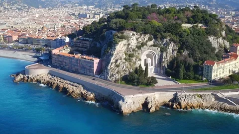 Aerial shot of Nice seafront tracking east towards Castle Hill Stock Footage 121330436