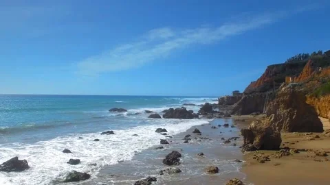 Aerial shot of ocean shore at El Matador Beach in Malibu, Califronia, USA Stock Footage 137361453
