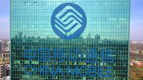 Aerial shot of office skyscraper with China Mobile logo. Modern office building Stock Footage
