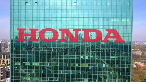 Aerial shot of office skyscraper with Honda logo. Modern office building Stock Footage