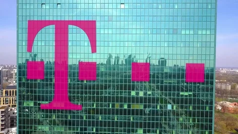 Aerial shot of office skyscraper with T-Mobile logo. Modern office building Stock Footage