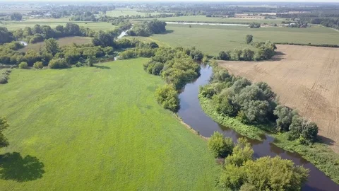Aerial shot of old bridge on the river. Видео 92759863