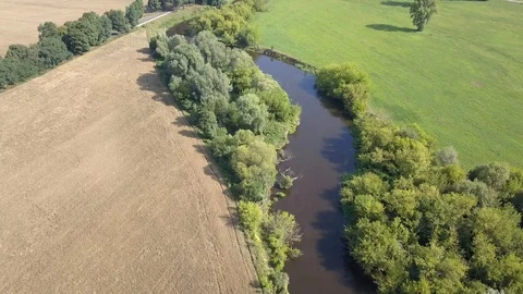 Aerial shot of old bridge on the river. Видео 92763564