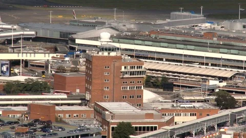 Aerial shot, Old Control Tower At Heathrow Airport, Hazy Sun Stock Footage 107094772