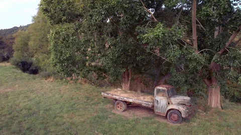 Aerial shot of an old rusty abandoned truck Stock Footage 124396661