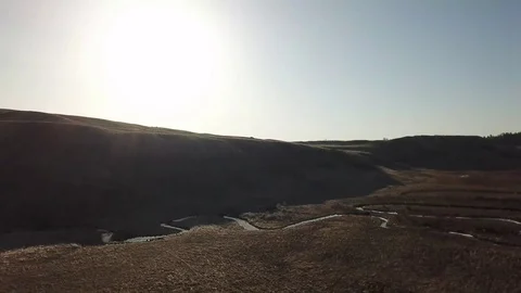 Aerial shot of an open field Stock Footage 89455655
