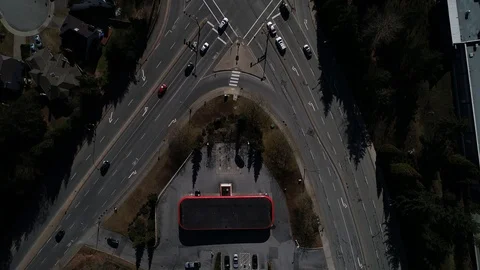 Aerial Shot Over Busy Intersection Tracking Driving Cars On Road Stock Footage 104783027