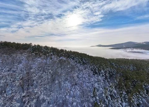 Aerial shot over the clouds while sunrise sky. Foto stock