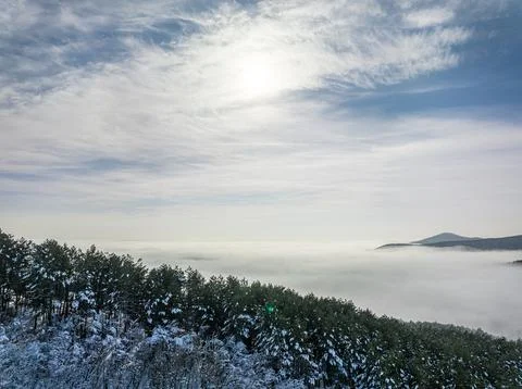 Aerial shot over the clouds while sunrise sky. Foto stock